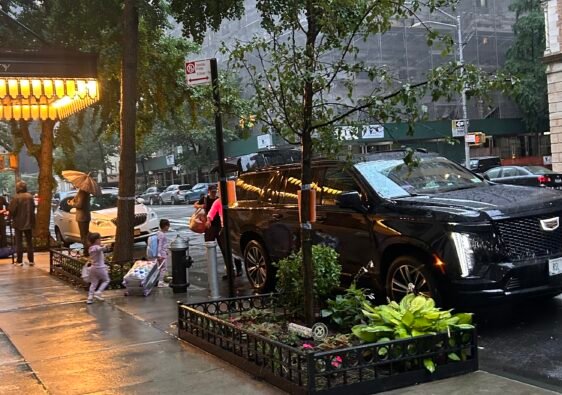 Ride in Style airport car service waiting on a rainy evening in New York City
