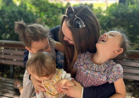 Mother with her three daughters enjoying a summer day in London